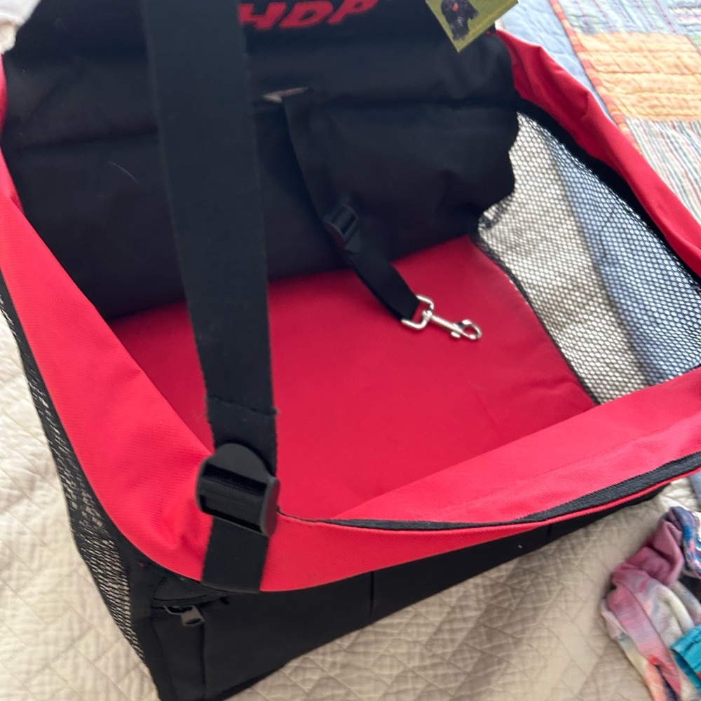 Dog Car Seat. Red and black for animals under 25 lbs. New with tags.